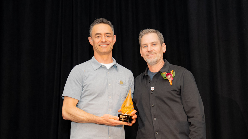 skye chilton CEO of Nammex and bill chioffi coo accept leadership award from AHPA at expo west 2025 in anaheim california