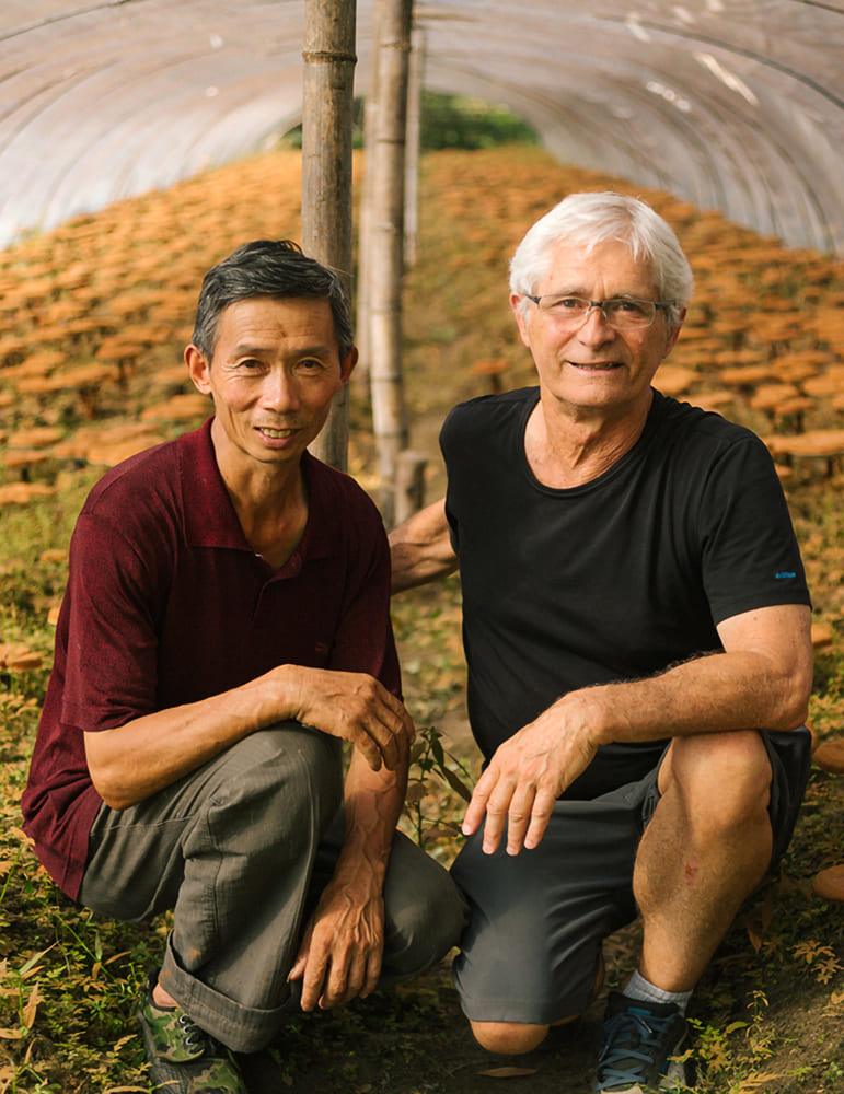 Jeff Chilton with organic mushroom farmer, Zhejiang province, China. Photo: Adam Chilton